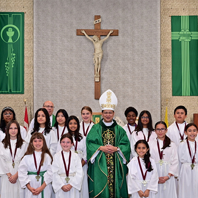 Altar servers with Bishop Nguyen